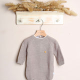 Einteiliger Playsuit „Le Chicche“. 